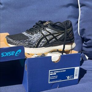 Asics Gel-Nimbus 22 Knit Black and Gold Sneakers